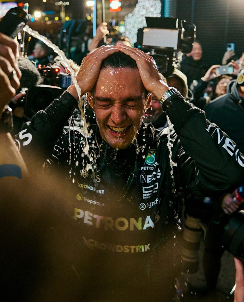 George Russel close up after champagne shower