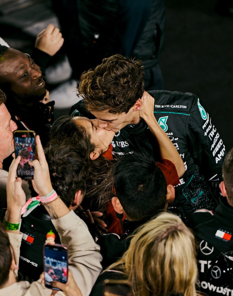 George Russel kissing partner after the race