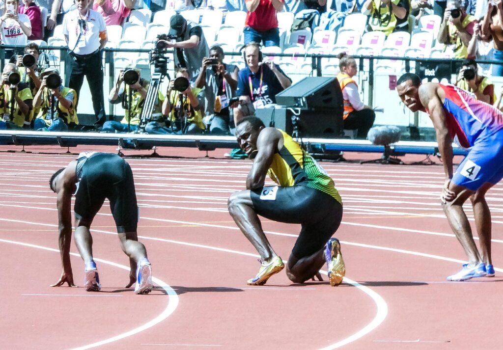 Usain bolt on the track with opponents