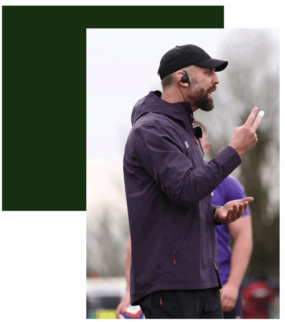 Picture shows side profile of Jonathan Pendlebury coaching an U18s training session
