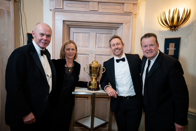 Sir Clive Woodward (first left) next to Dr Sherylle Calder (2nd left), Johnny Wilkinson (2nd right) and Richard Prescott (1st right), with the rugby world cup in the middle