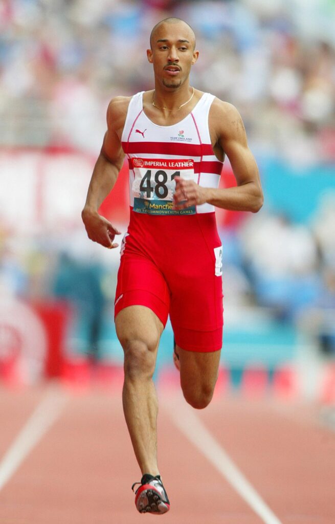 England's Chris Lambert in action during the first round of qualifying in the men's 200m of the 2002 Commonwealth Games at the City of Manchester Stadium, Manchester.