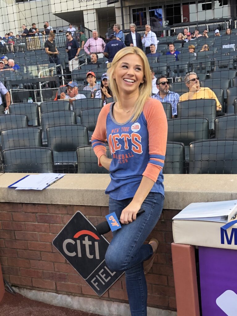 Emily Reppert in a blue and orange Mets t-shirt