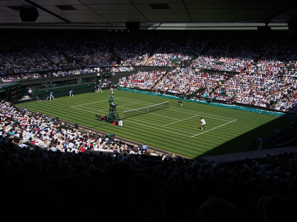 Wimbledon Court with fans filling the stands around